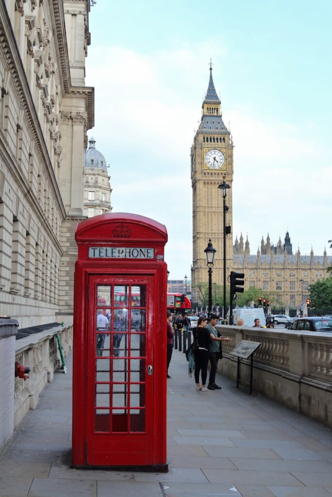 London, uk travel guide — your honest, warm, no-stress walkthrough of the city 2 Red telephone booth near brown concrete building during daytime